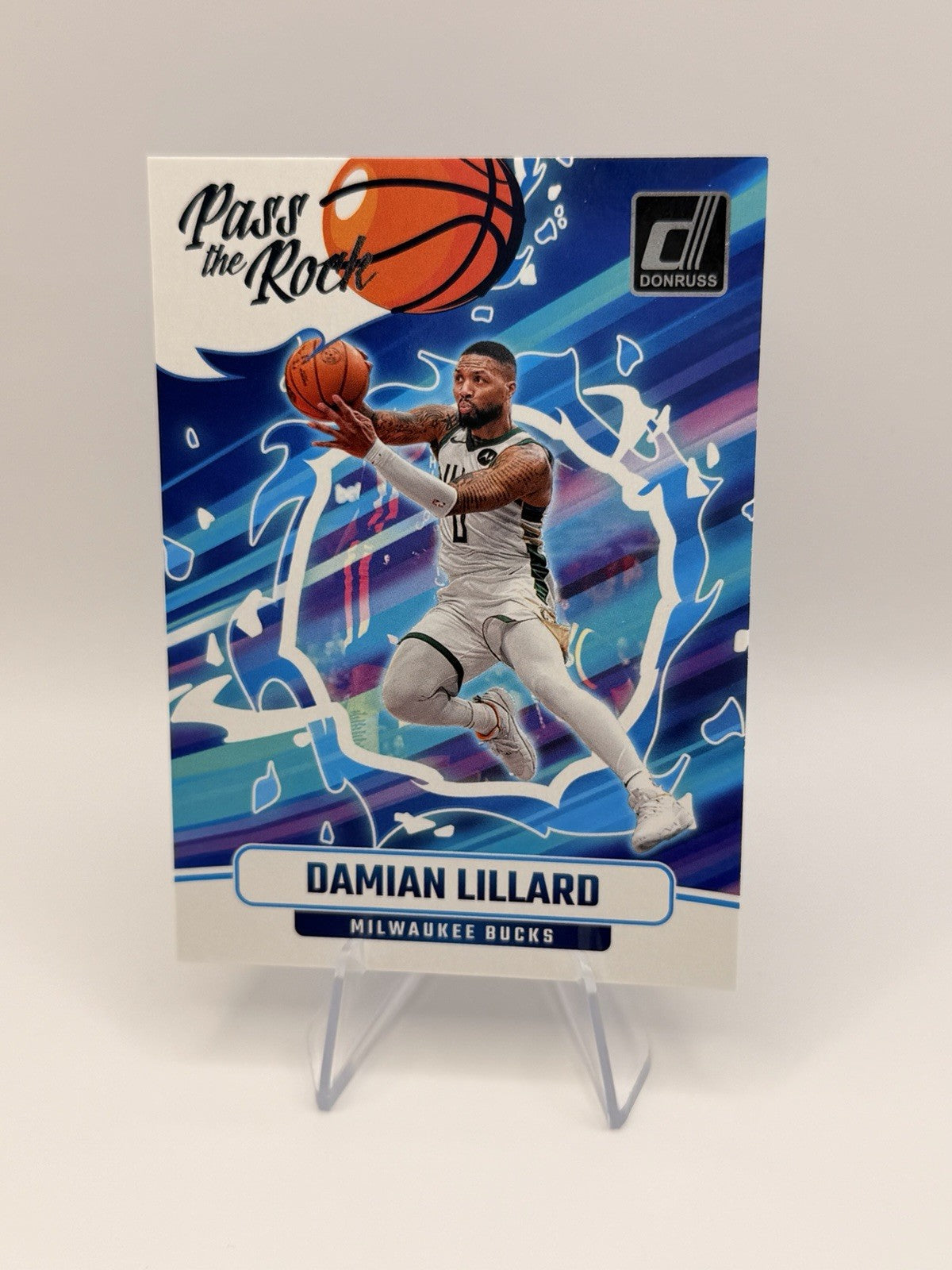 2024-25 Panini Donruss Damian Lillard Pass The Rock Insert Milwaukee Bucks #1