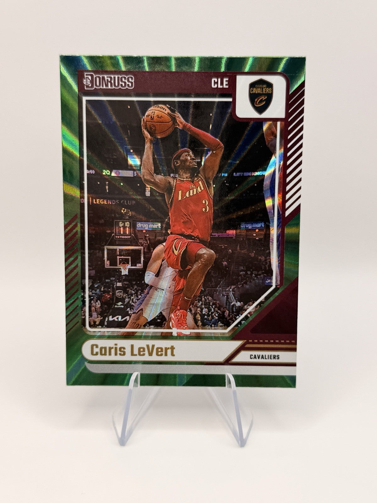 2024-25 Panini Donruss Caris LeVert Green Laser Parallel Cleveland Cavaliers #70