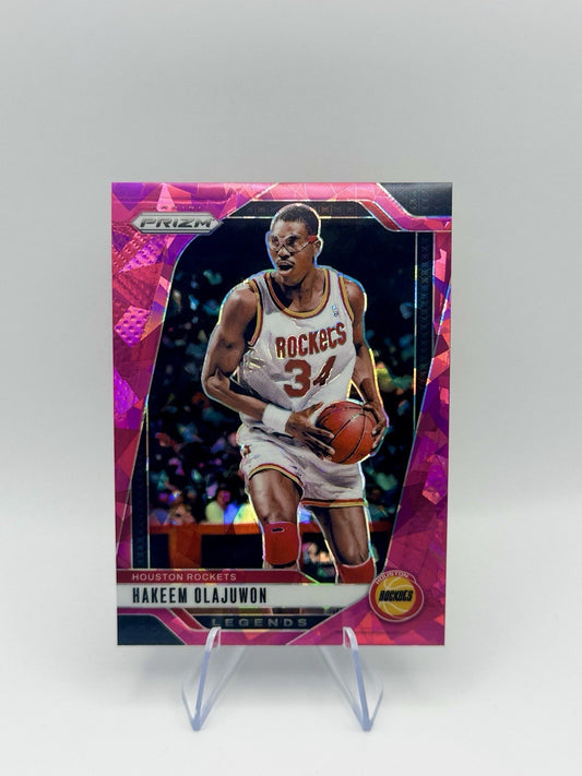 2024-25 Prizm Prizms Pink Cracked Ice #296 Hakeem Olajuwon Houston Rockets